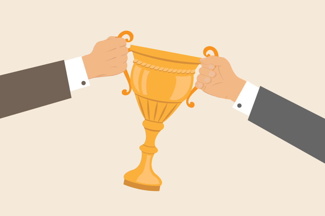 Business hands pulling cup