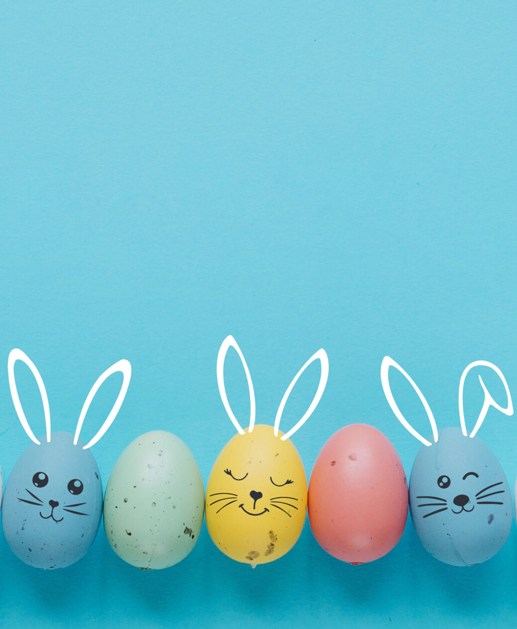 easter eggs with painted face copy space